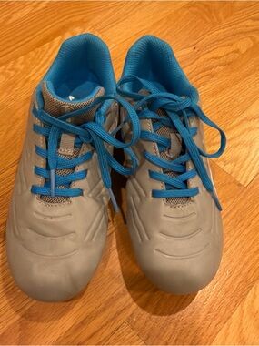 Kids Gray Soccer Cleats with Bright Blue Lining and Laces